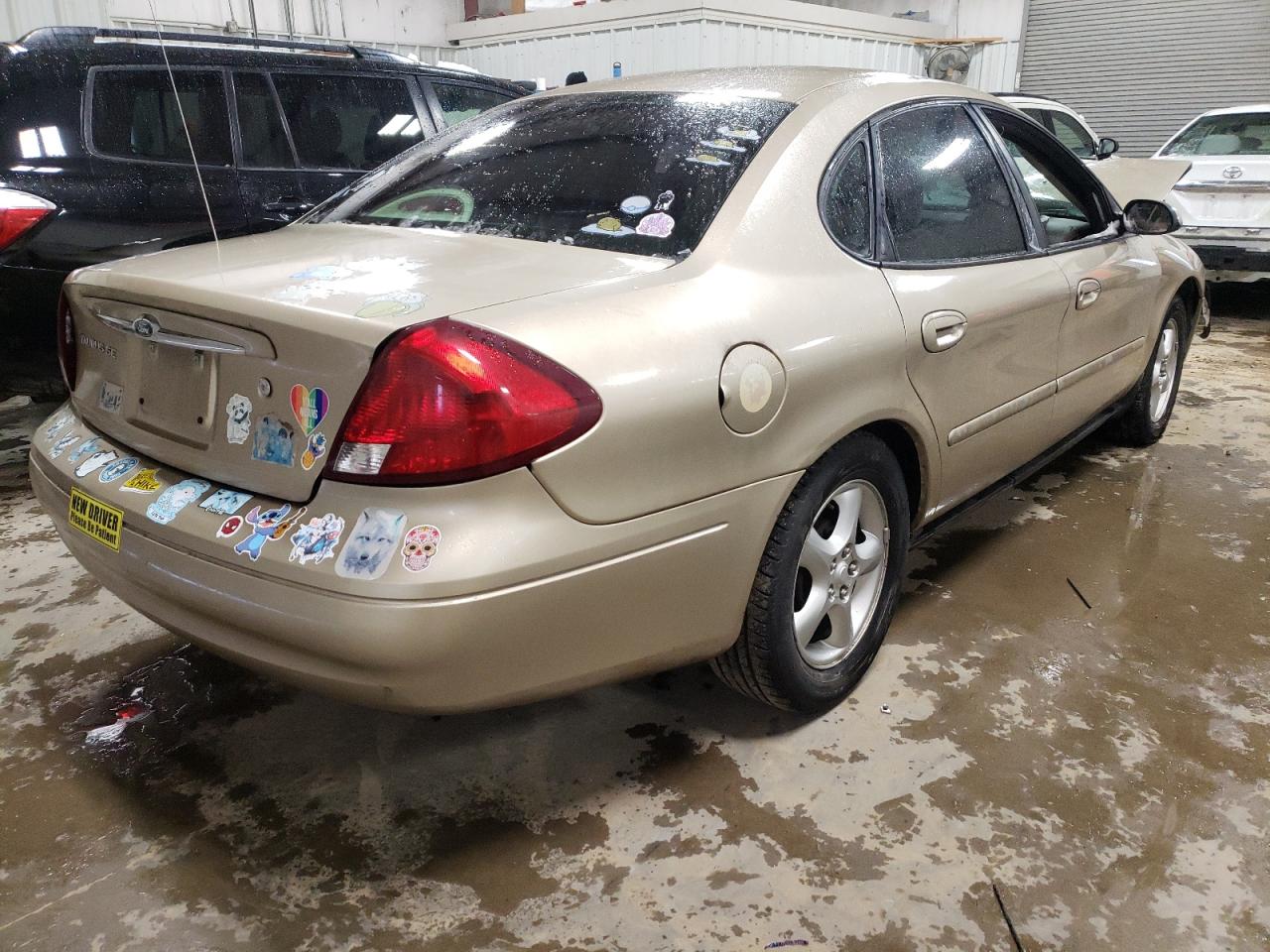 Photo 4 from auction – 2000 FORD TAURUS SE with VIN 1FAFP53U3YA102311