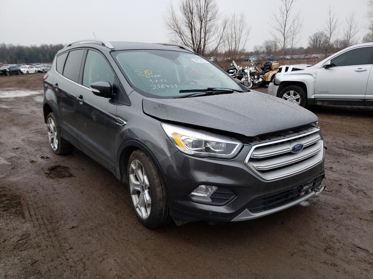 FORD ESCAPE TIT 2019 with VIN 1FMCU0J98KUC09556 - Photo from auction