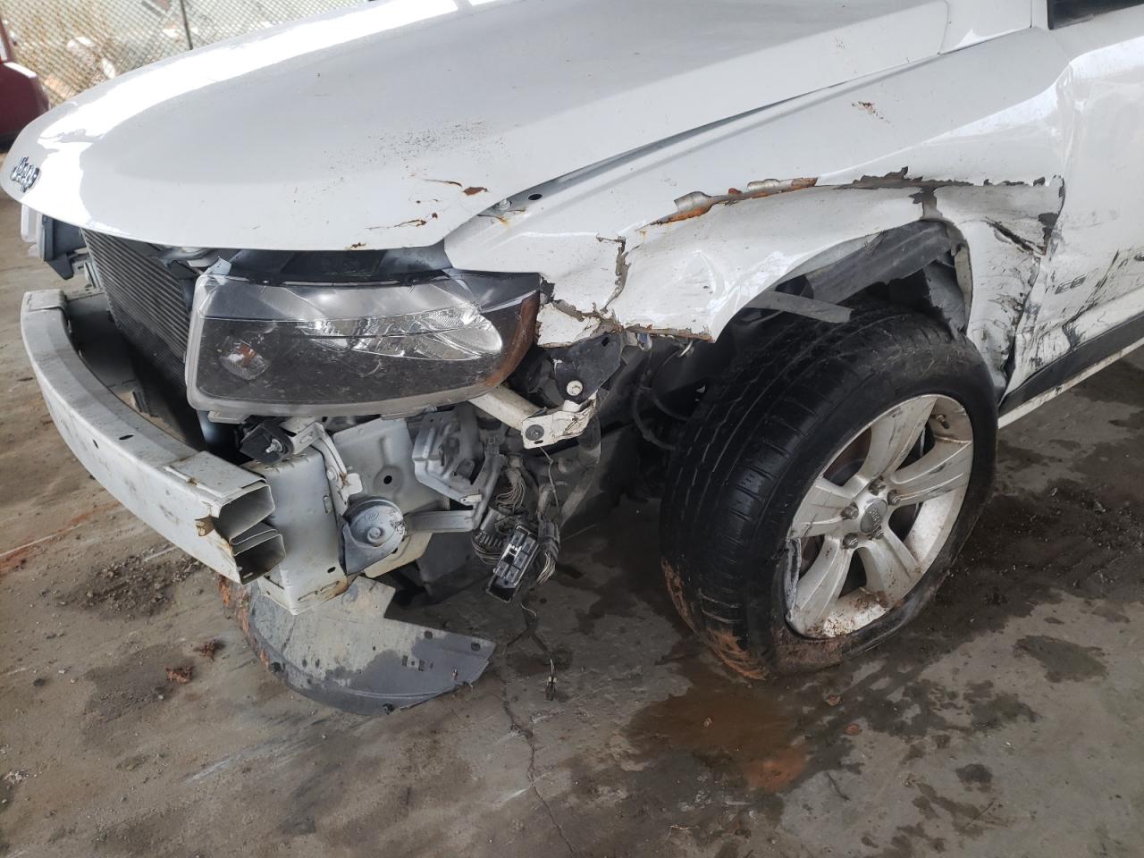 Photo 9 from auction – 2012 JEEP COMPASS LA with VIN 1C4NJCEB8CD688129