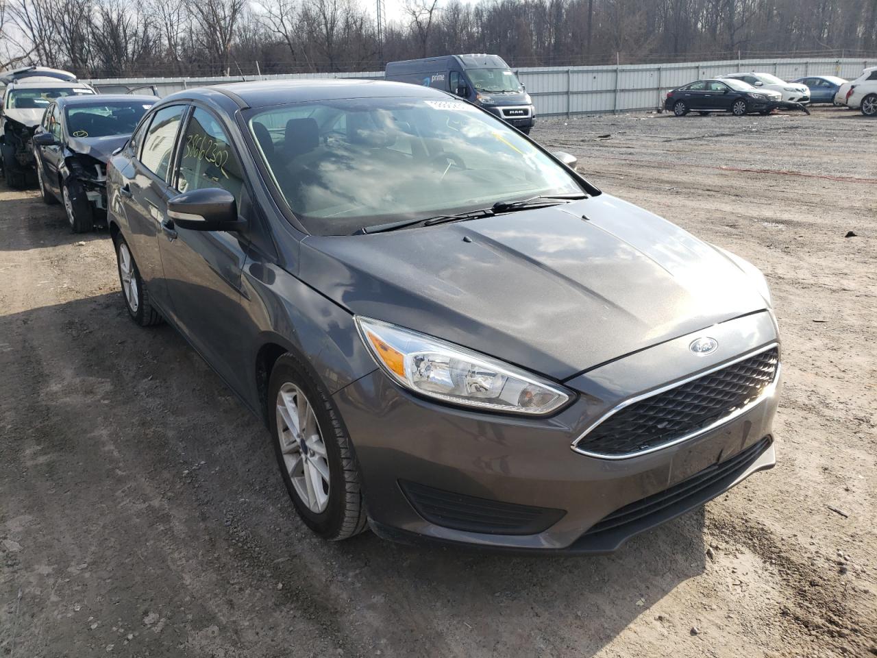 FORD FOCUS SE 2016 with VIN 1FADP3F26GL299788 - Photo from auction