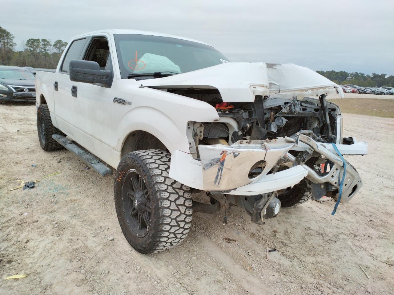 FORD F150 SUPER 2013 with VIN 1FTFW1CF8DFD93294 - Photo from auction