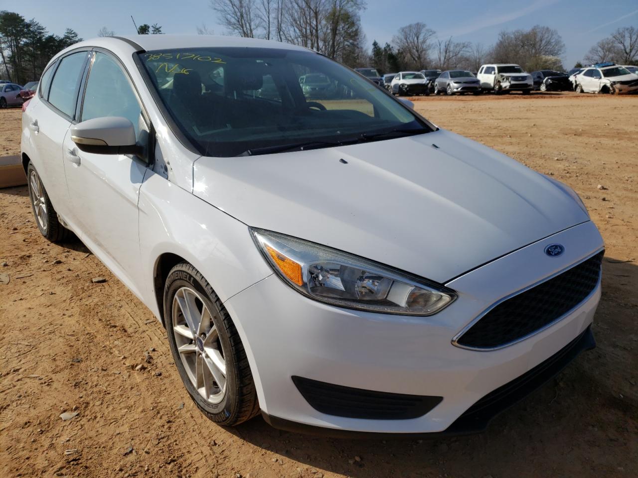FORD FOCUS SE 2015 with VIN 1FADP3K28FL242089 - Photo from auction