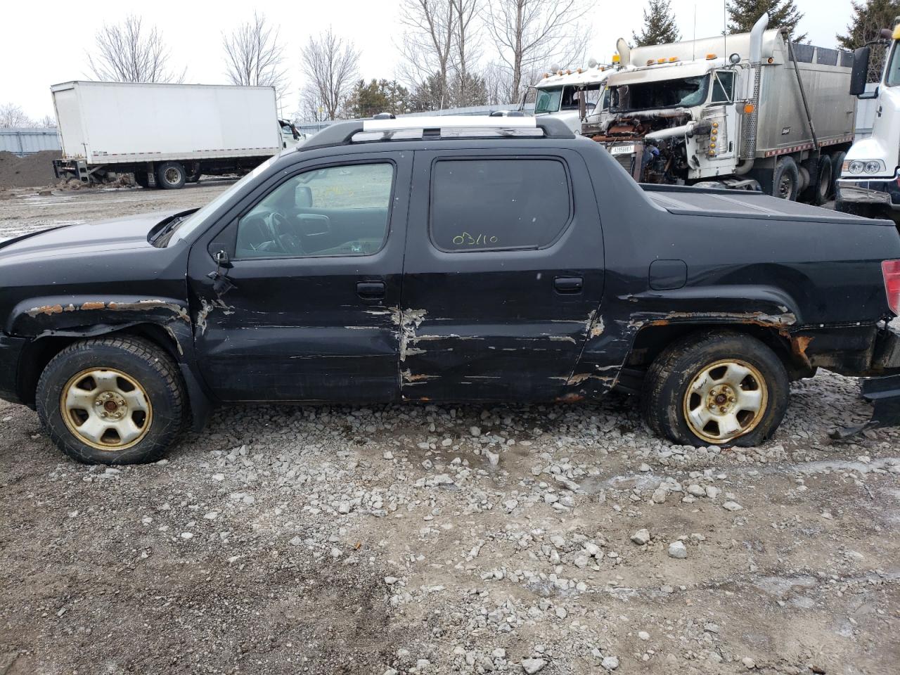 Photo 9 from auction – 2010 HONDA RIDGELINE with VIN 5FPYK1F57AB501113