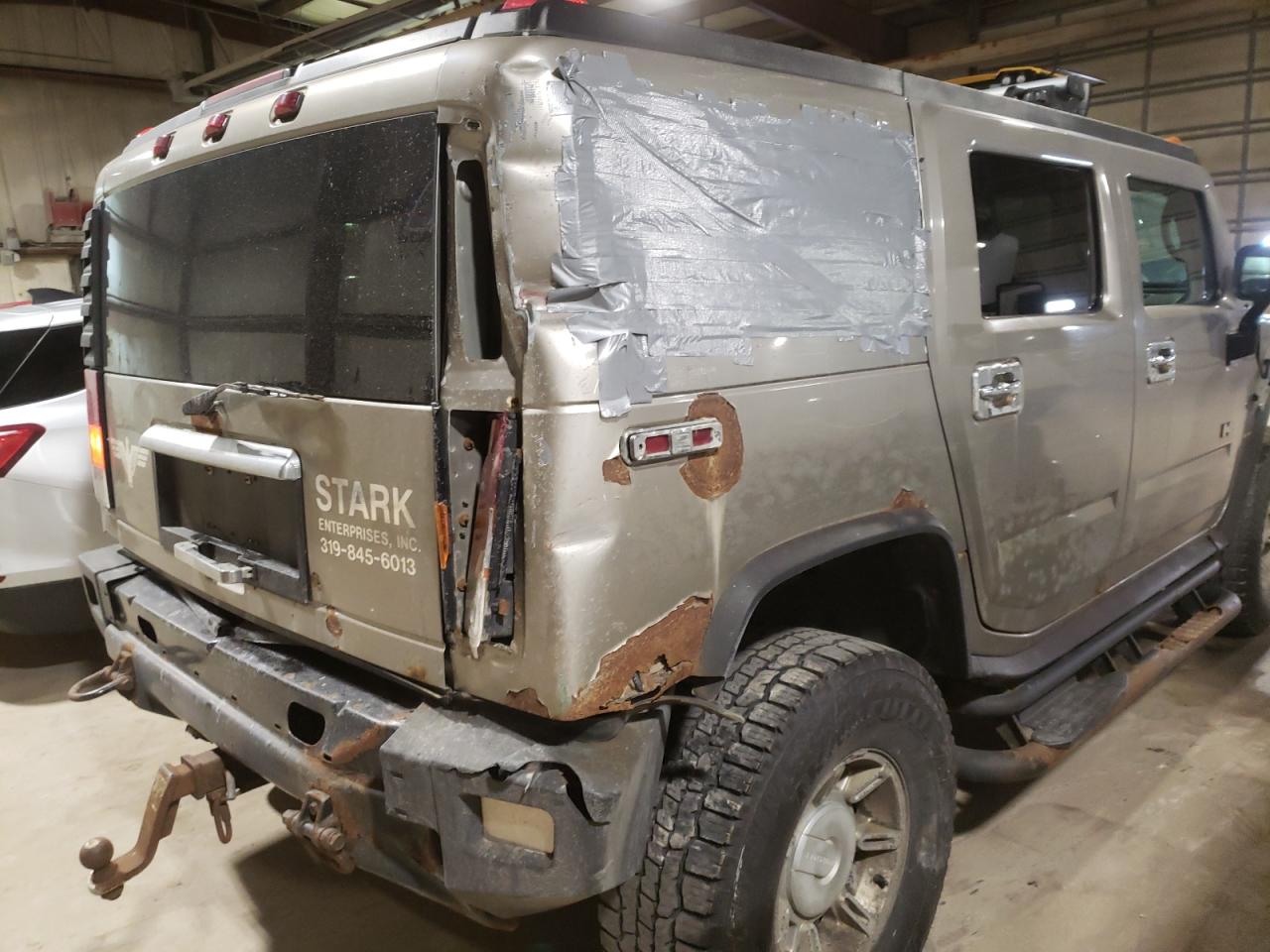 Photo 9 from auction – 2003 HUMMER H2 with VIN 5GRGN23U03H126650
