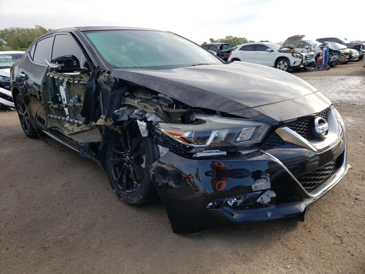 NISSAN MAXIMA 3.5 2017 with VIN 1N4AA6AP4HC390942 - Photo from auction