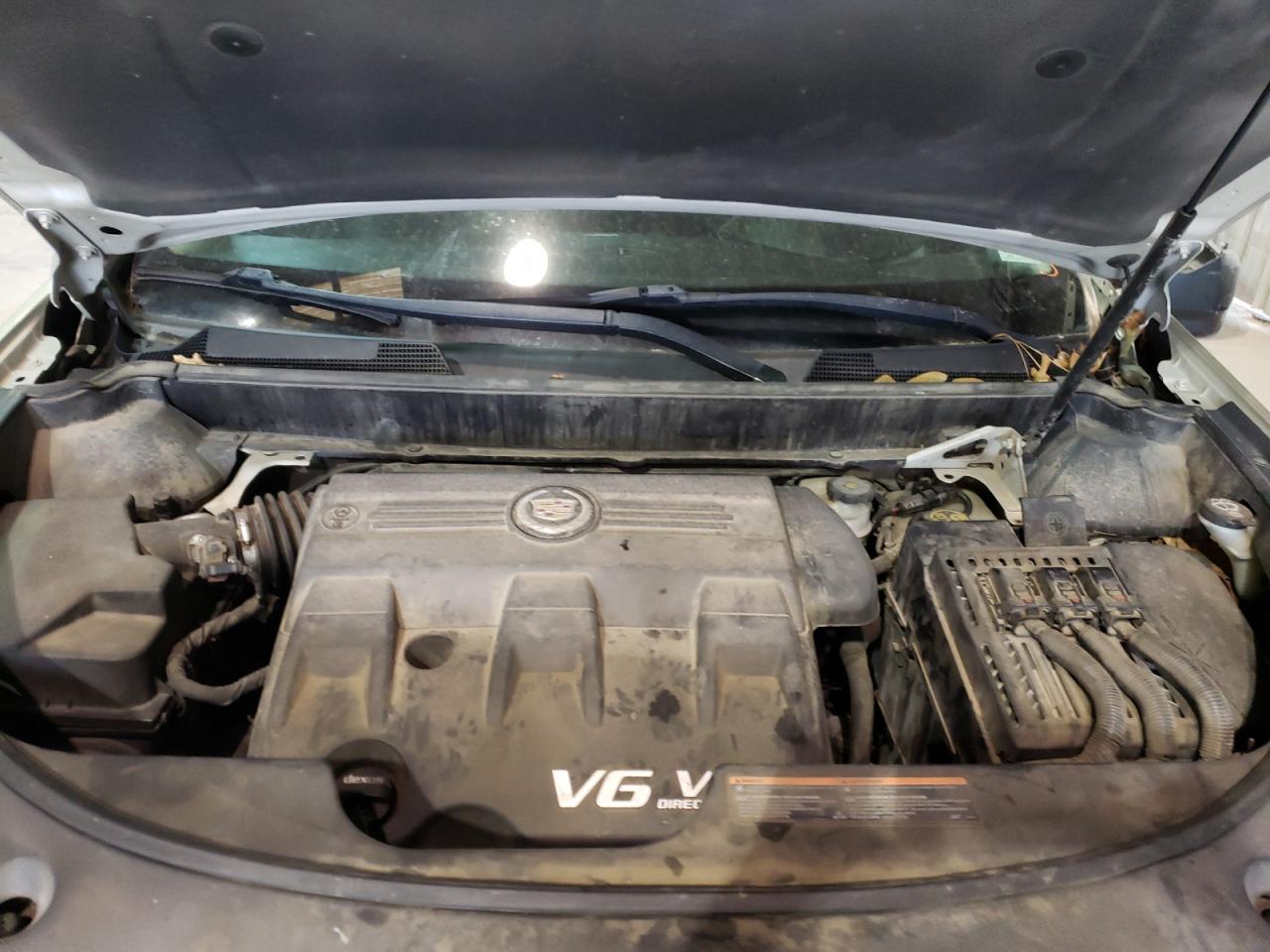 Photo 7 from auction – 2013 CADILLAC SRX with VIN 3GYFNAE35DS654649