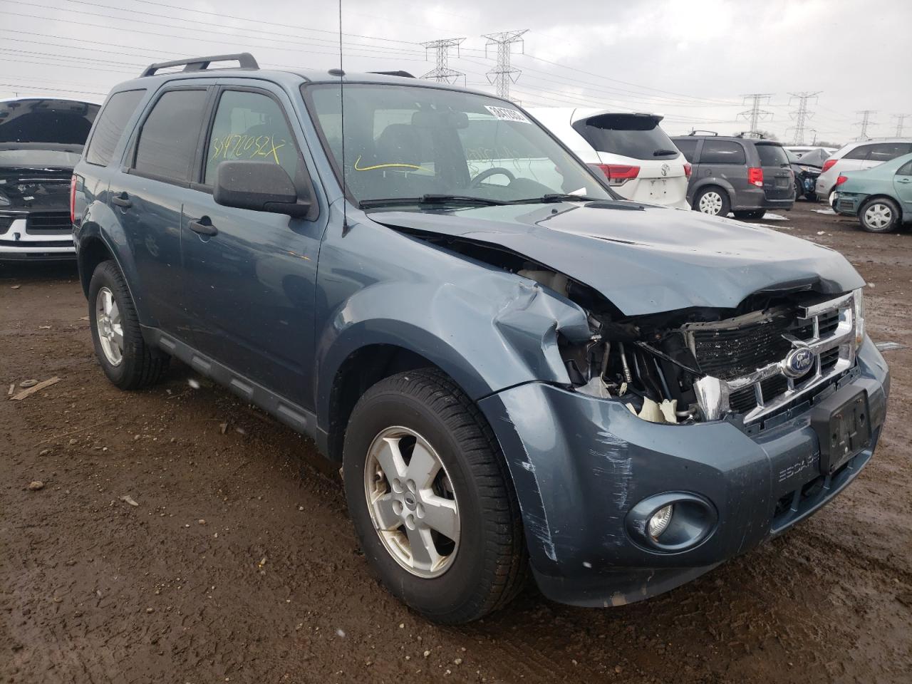 FORD ESCAPE XLT 2011 with VIN 1FMCU0D73BKB20290 - Photo from auction