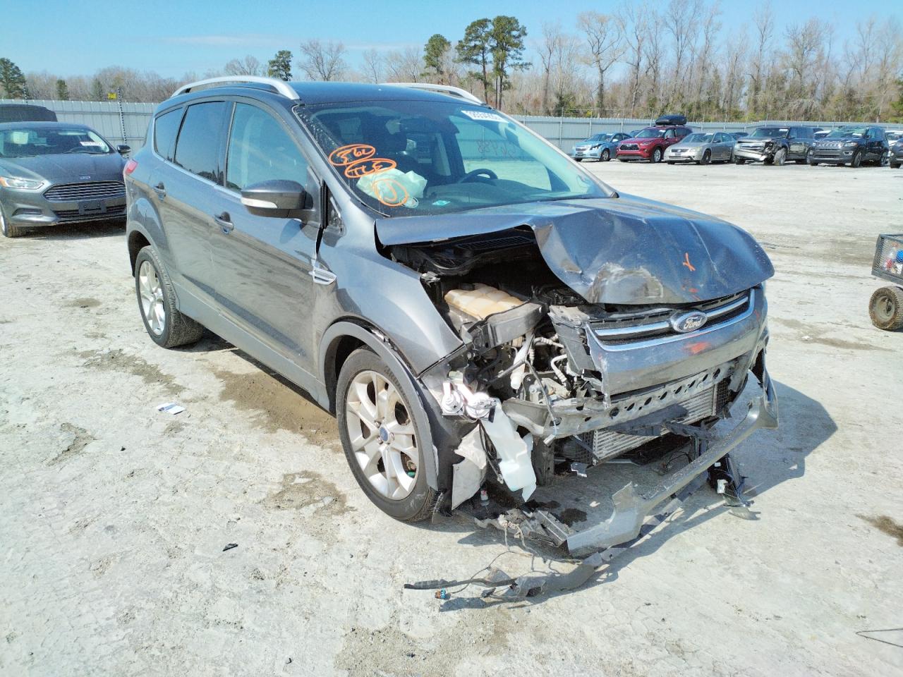 FORD ESCAPE TIT 2015 with VIN 1FMCU0J94FUB16054 - Photo from auction
