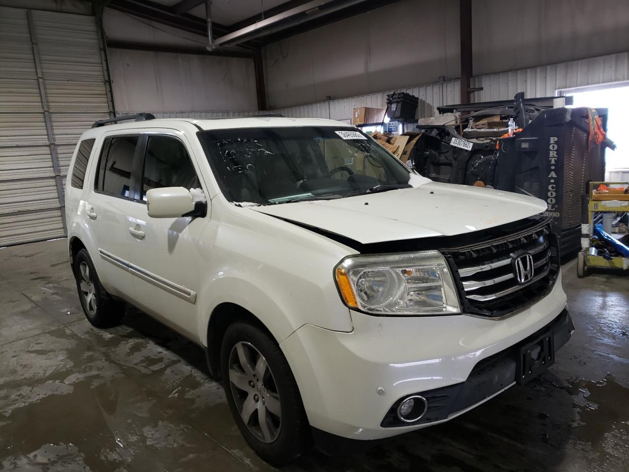 HONDA PILOT TOUR 2012 with VIN 5FNYF3H91CB027123 - Photo from auction