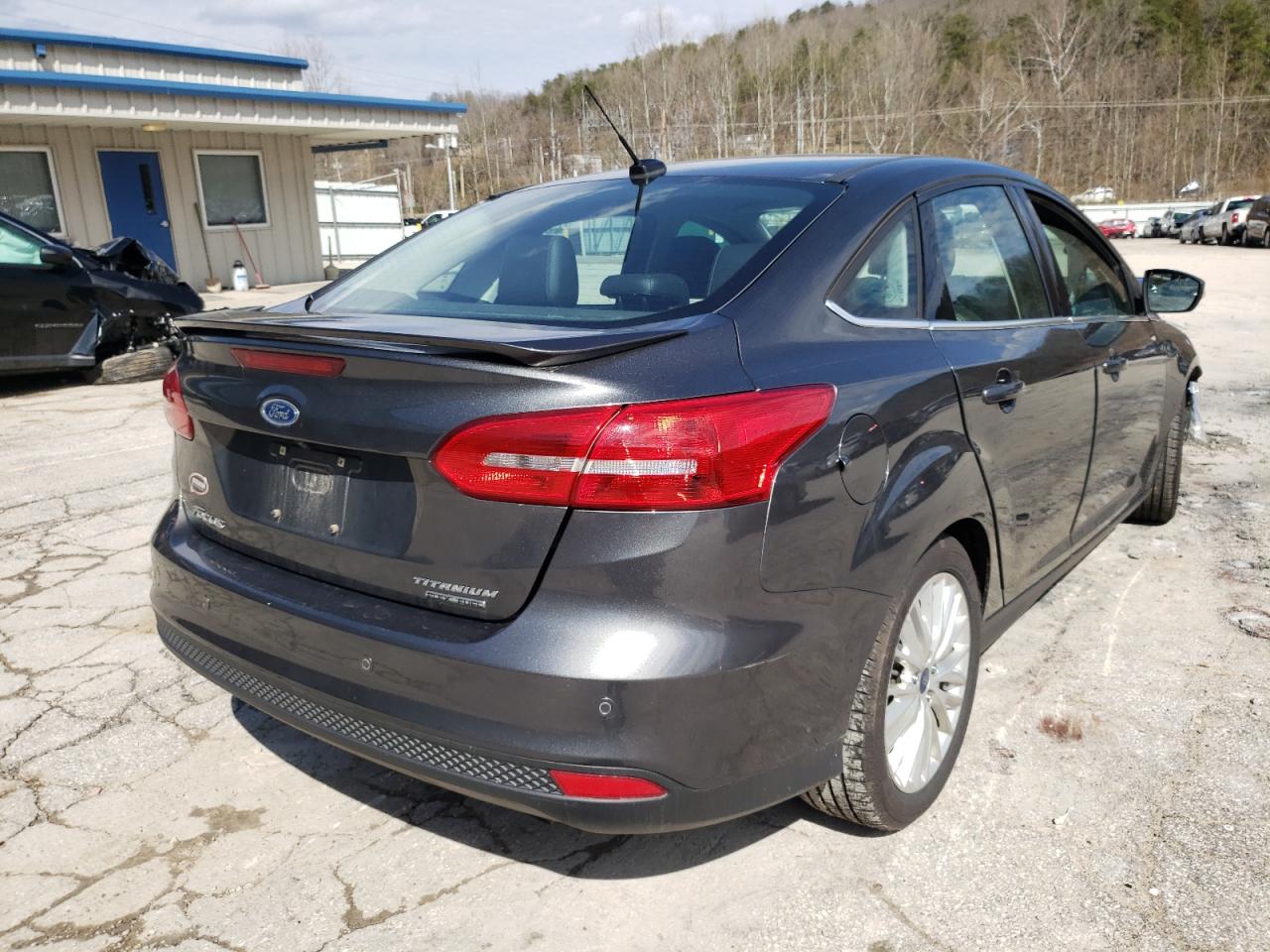 Photo 4 from auction – 2016 FORD FOCUS TITA with VIN 1FADP3J2XGL384849