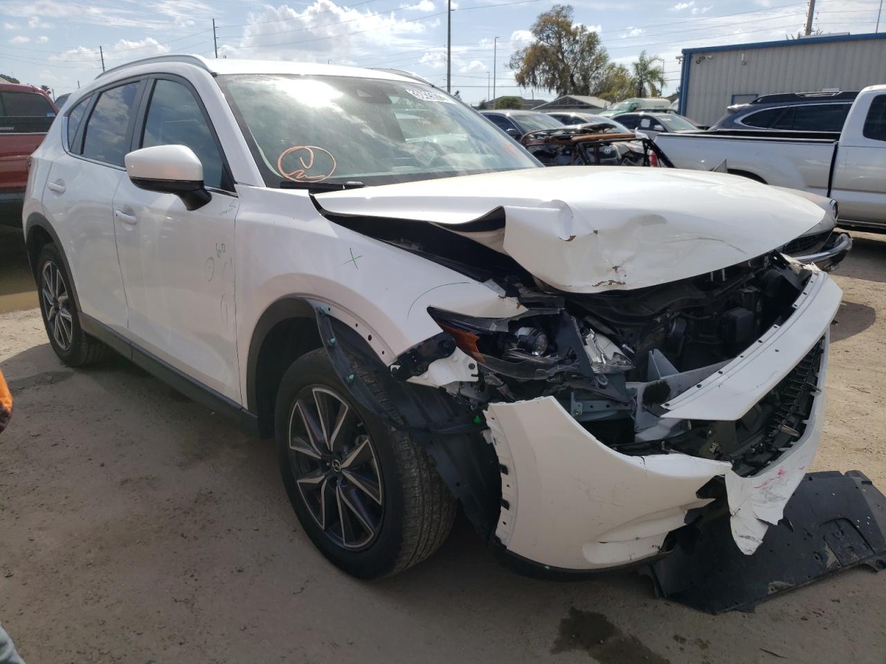 MAZDA CX-5 TOURI 2018 with VIN JM3KFACM0J1449791 - Photo from auction