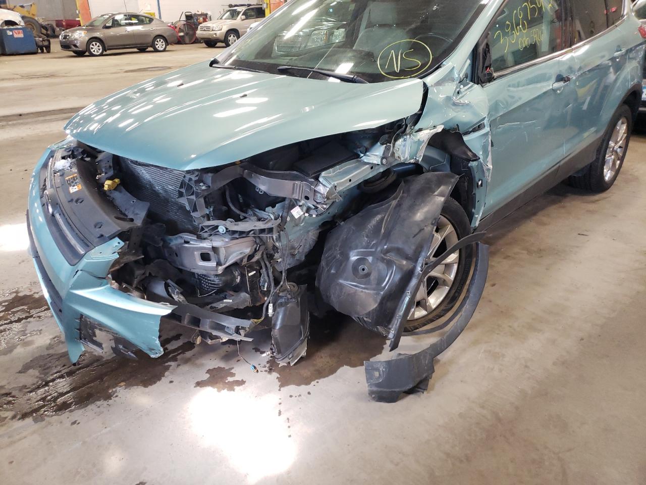 Photo 9 from auction – 2013 FORD ESCAPE SEL with VIN 1FMCU9H90DUD67385