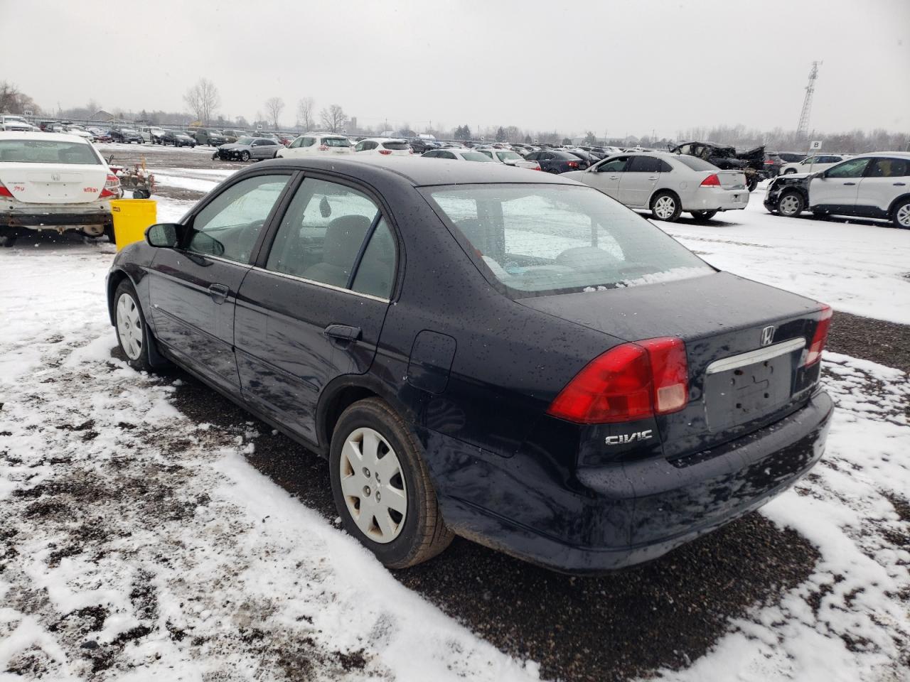 Photo 3 from auction – 2002 HONDA CIVIC LX with VIN 2HGES16872H942419