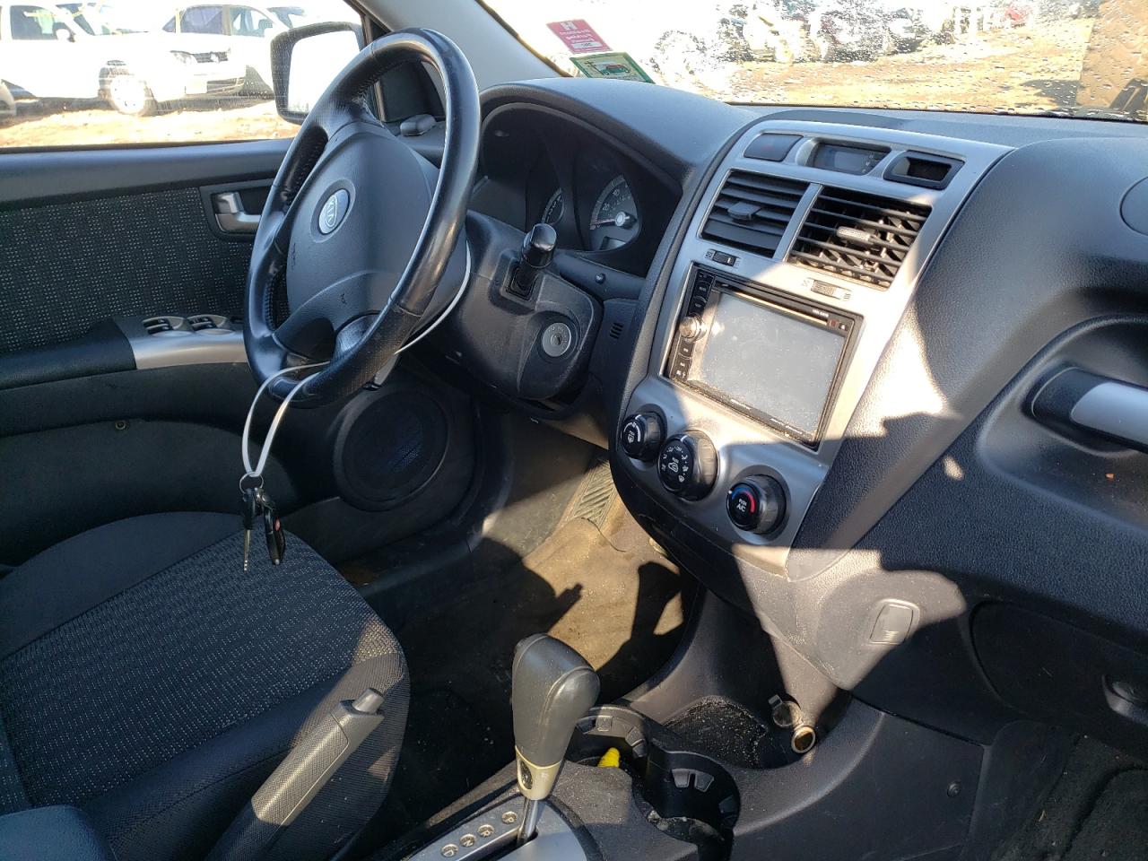 Photo 9 from auction – 2007 KIA SPORTAGE E with VIN KNDJE723877359202