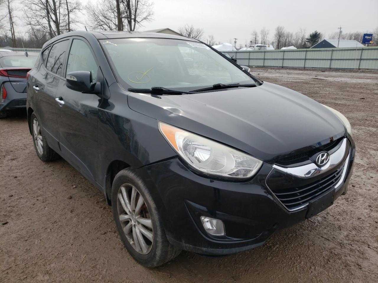 HYUNDAI TUCSON GLS 2012 with VIN KM8JUCACXCU542864 - Photo from auction