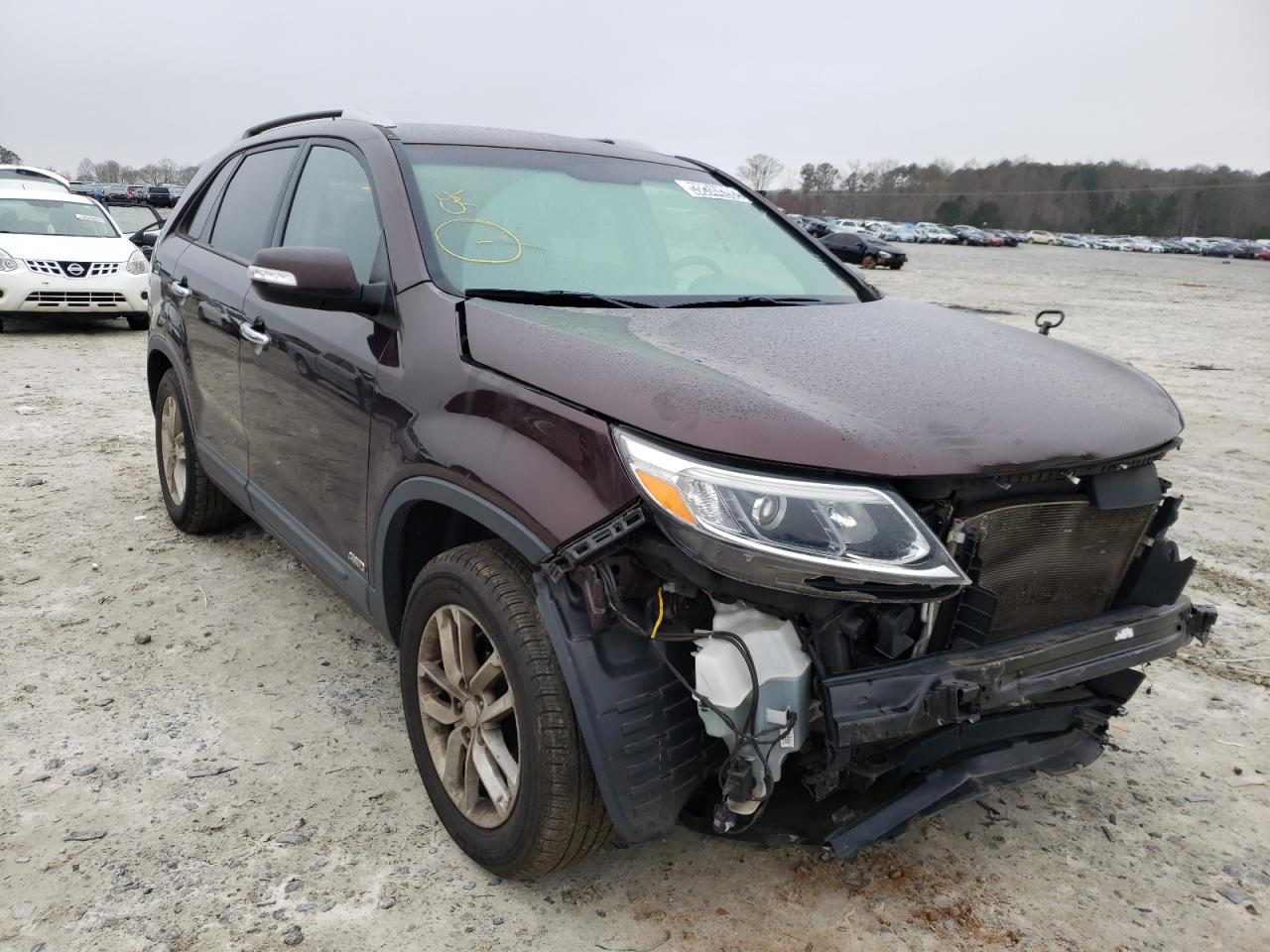 KIA SORENTO LX 2015 with VIN 5XYKTCA63FG560991 - Photo from auction