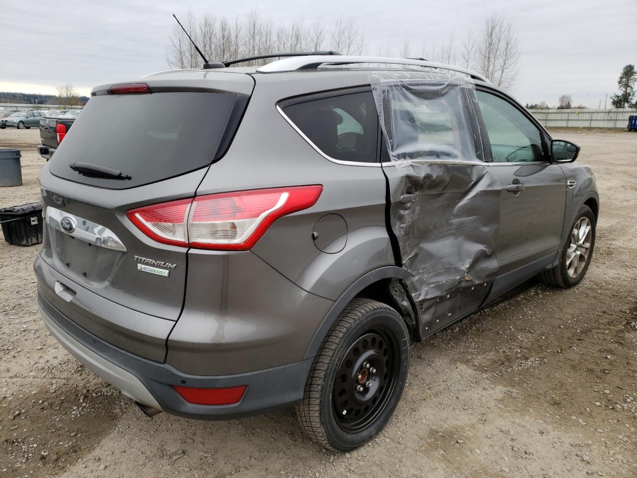 Photo 4 from auction – 2014 FORD ESCAPE TIT with VIN 1FMCU0J90EUE00800