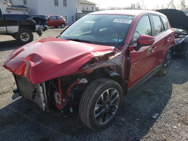 Photo 2 from auction – 2016 MAZDA CX-5 GT with VIN JM3KE4DY2G0906542