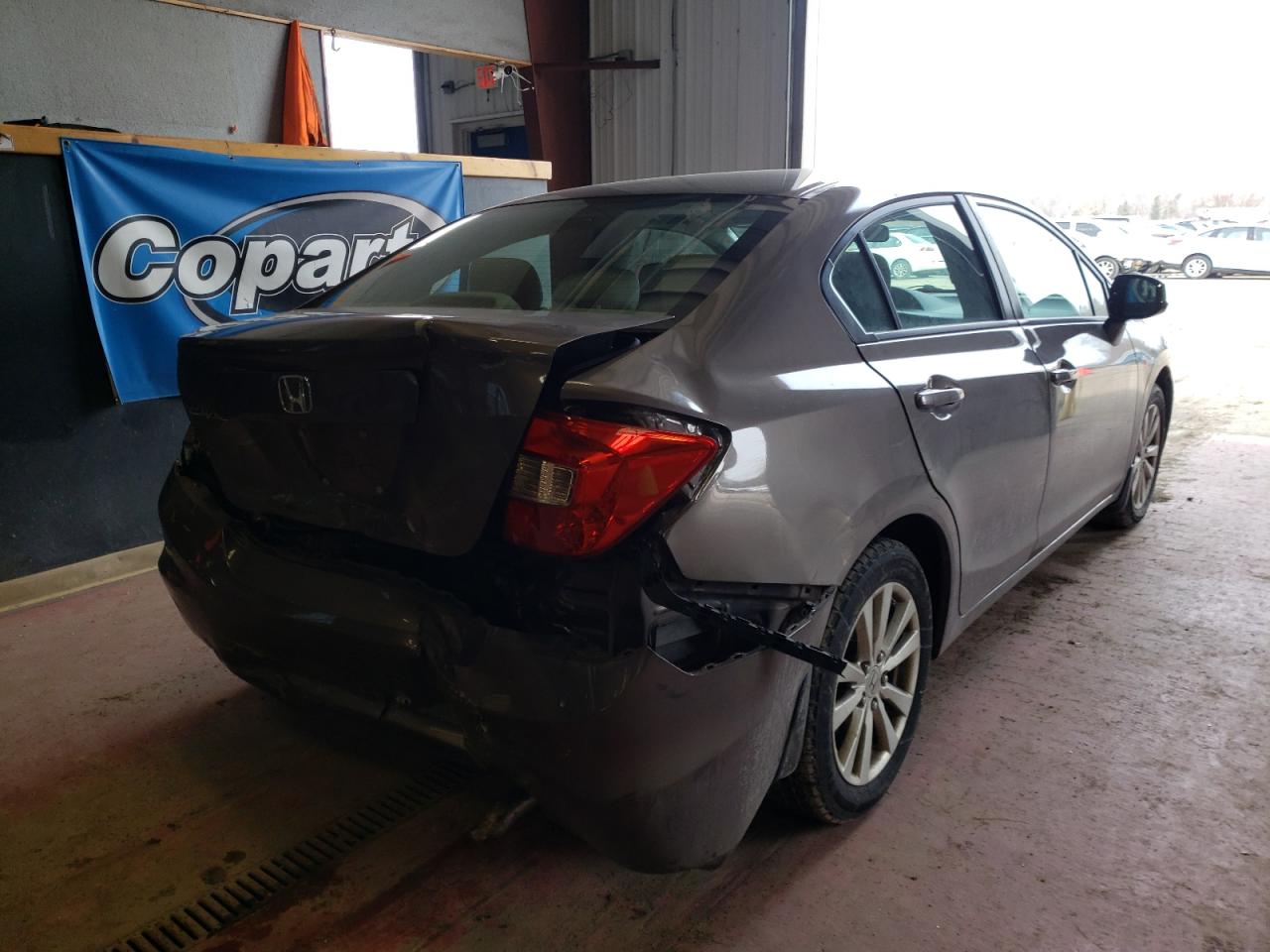 Photo 4 from auction – 2012 HONDA CIVIC EXL with VIN 2HGFB2F96CH522221