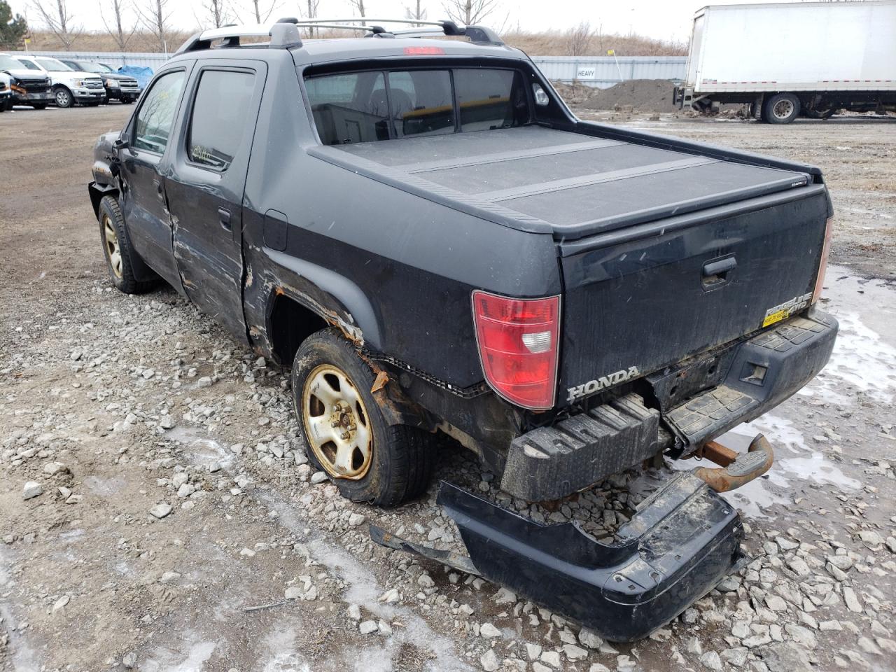 Photo 3 from auction – 2010 HONDA RIDGELINE with VIN 5FPYK1F57AB501113