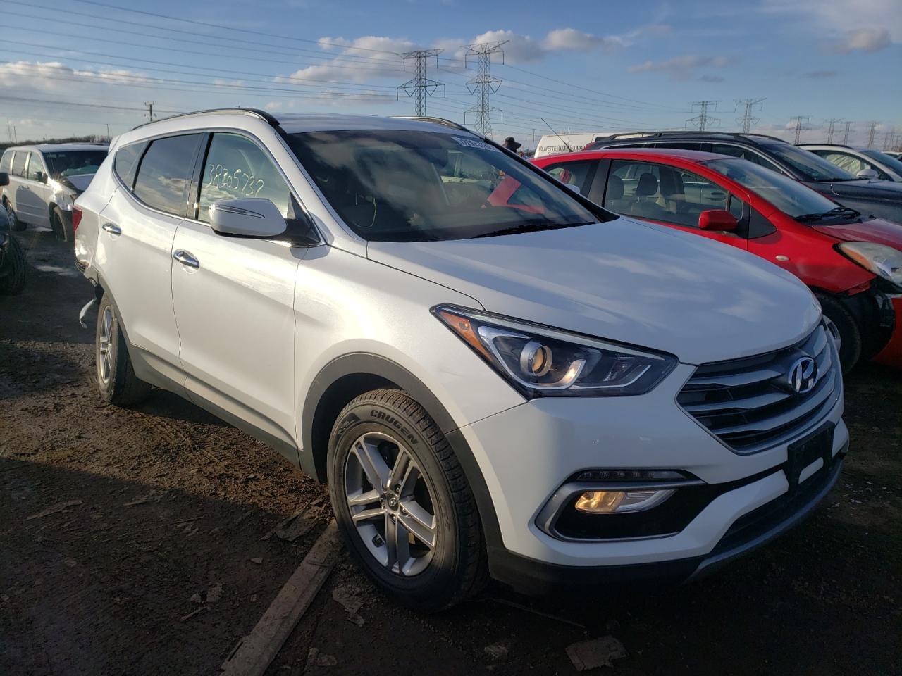 HYUNDAI SANTA FE S 2018 with VIN 5NMZU3LB9JH073752 - Photo from auction