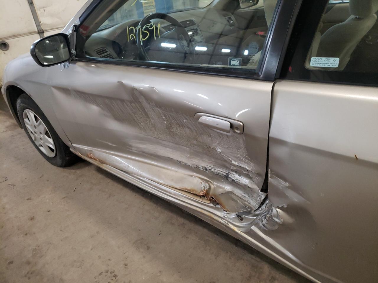 Photo 9 from auction – 2003 HONDA CIVIC LX with VIN 1HGEM225X3L015642