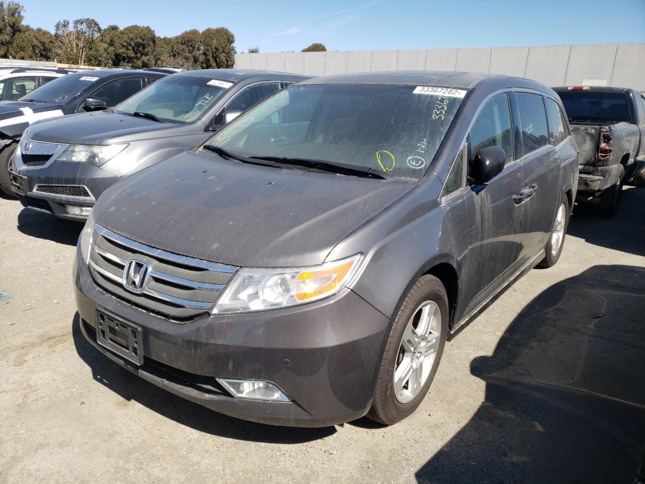 Photo 2 from auction – 2013 HONDA ODYSSEY TO with VIN 5FNRL5H97DB072495