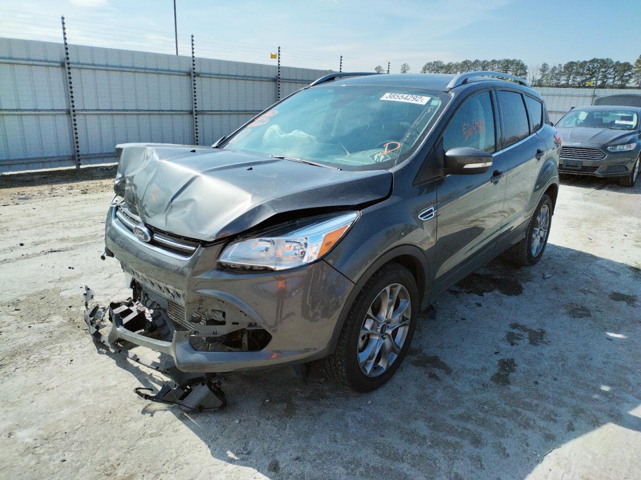 Photo 2 from auction – 2015 FORD ESCAPE TIT with VIN 1FMCU0J94FUB16054