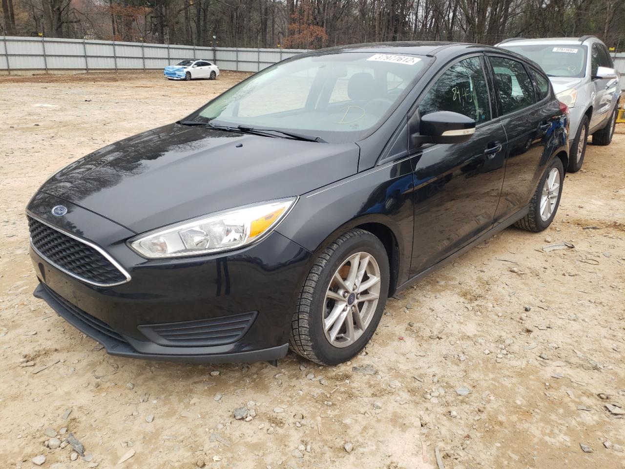 Photo 2 from auction – 2015 FORD FOCUS SE with VIN 1FADP3K21FL343734