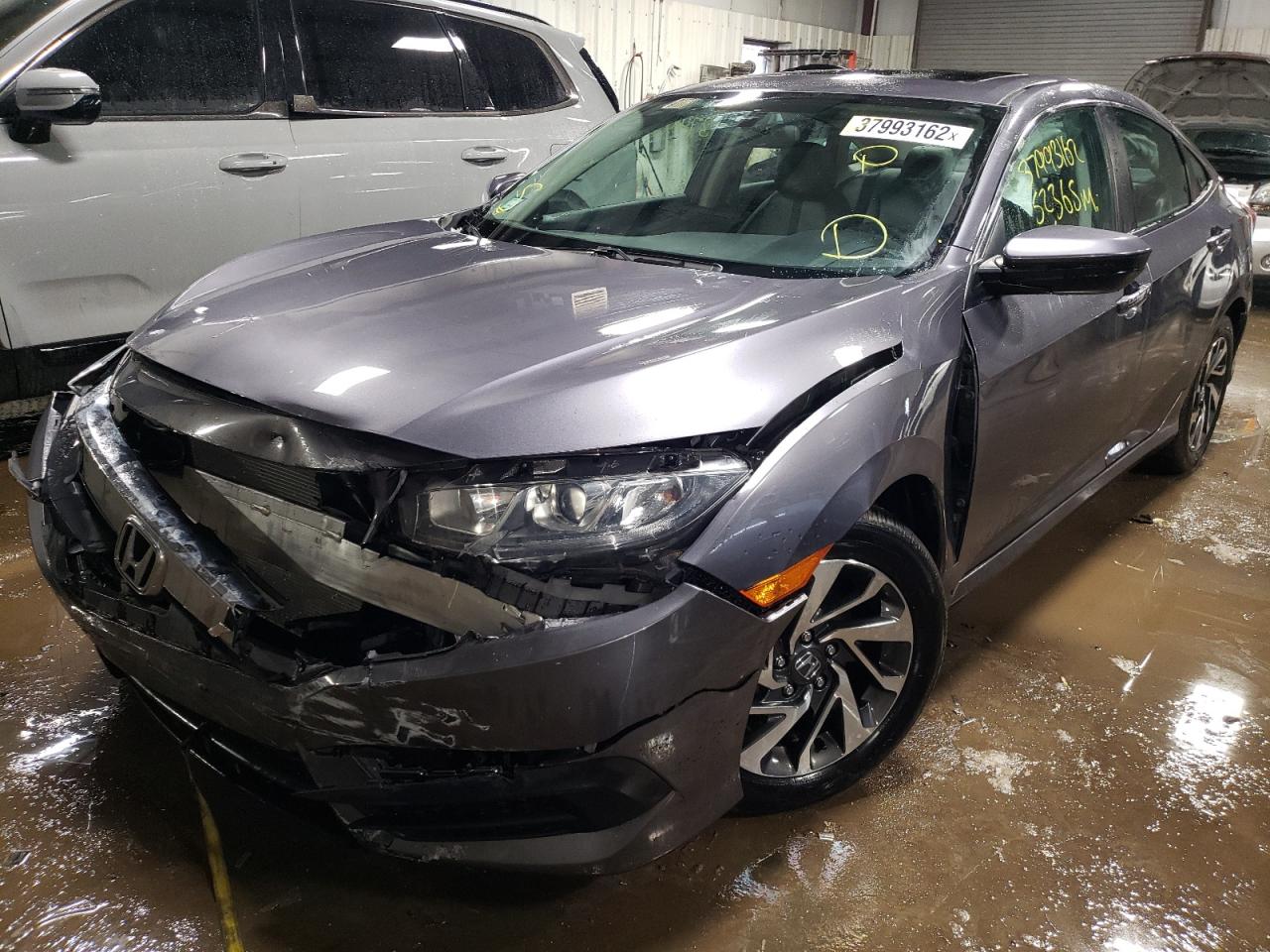 Photo 2 from auction – 2017 HONDA CIVIC EX with VIN 19XFC2F78HE079552