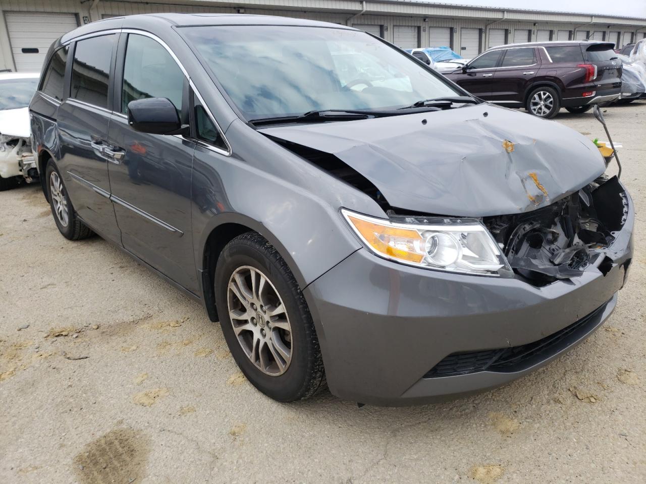 HONDA ODYSSEY EX 2011 with VIN 5FNRL5H61BB061799 - Photo from auction