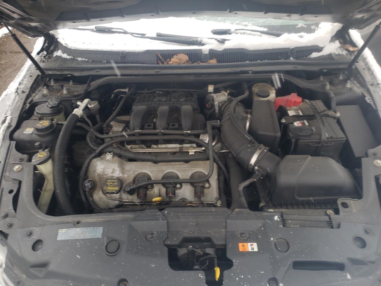 Photo 7 from auction – 2012 FORD TAURUS SE with VIN 1FAHP2DW2CG114382