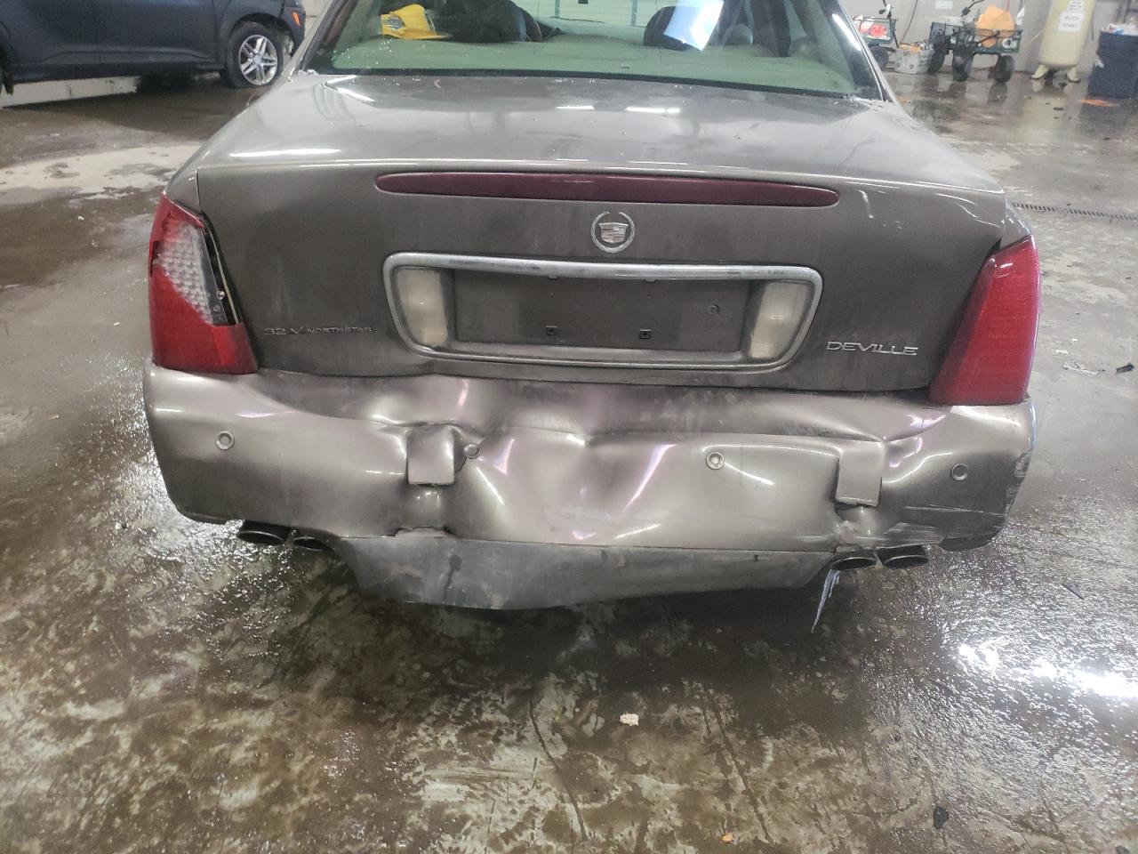 Photo 9 from auction – 2003 CADILLAC DEVILLE with VIN 1G6KD54Y53U219952