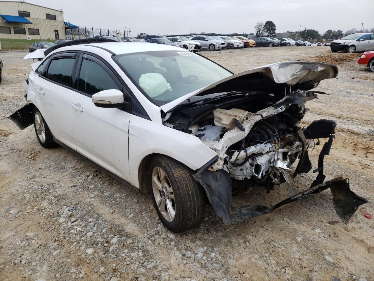 FORD FOCUS SE 2013 con VIN 1FADP3F28DL325738 - Foto de la subasta
