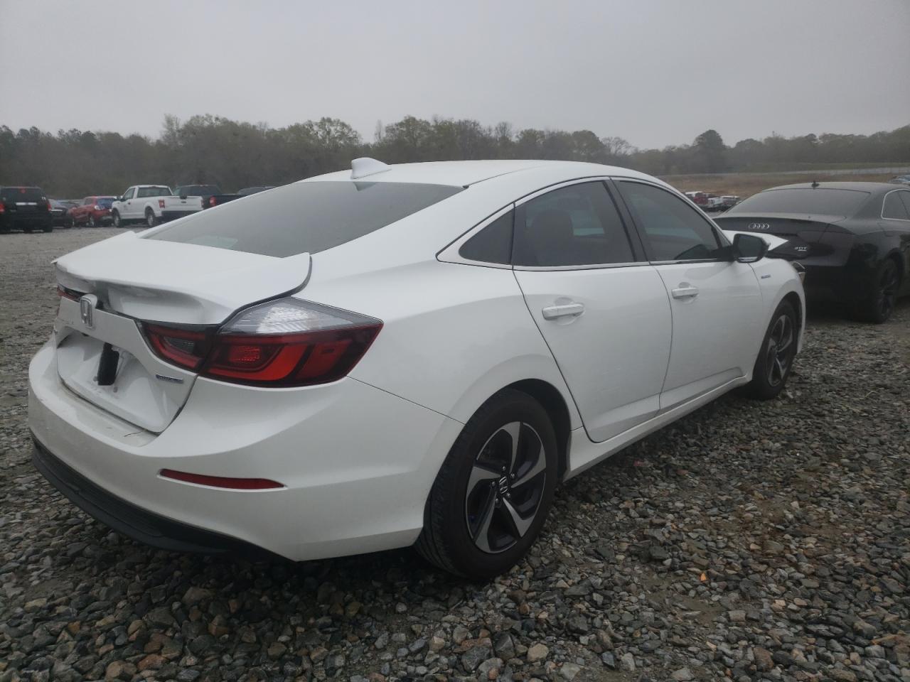 Photo 4 from auction – 2021 HONDA INSIGHT EX with VIN 19XZE4F58ME007987