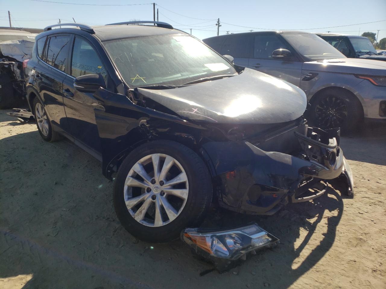 TOYOTA RAV4 LIMIT 2015 with VIN 2T3YFREV0FW200262 - Photo from auction