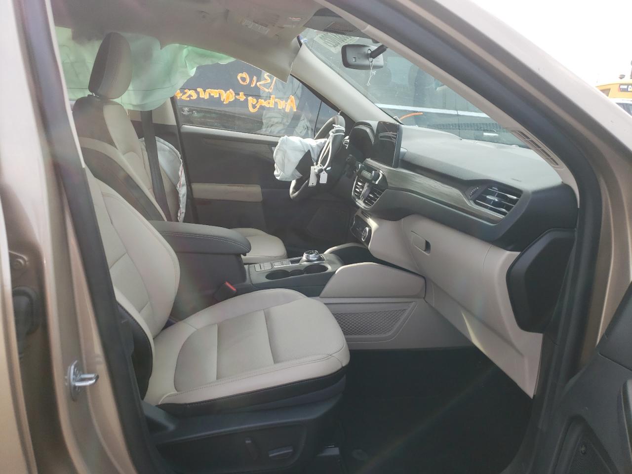 Photo 5 from auction – 2020 FORD ESCAPE TIT with VIN 1FMCU9DZ0LUC06006