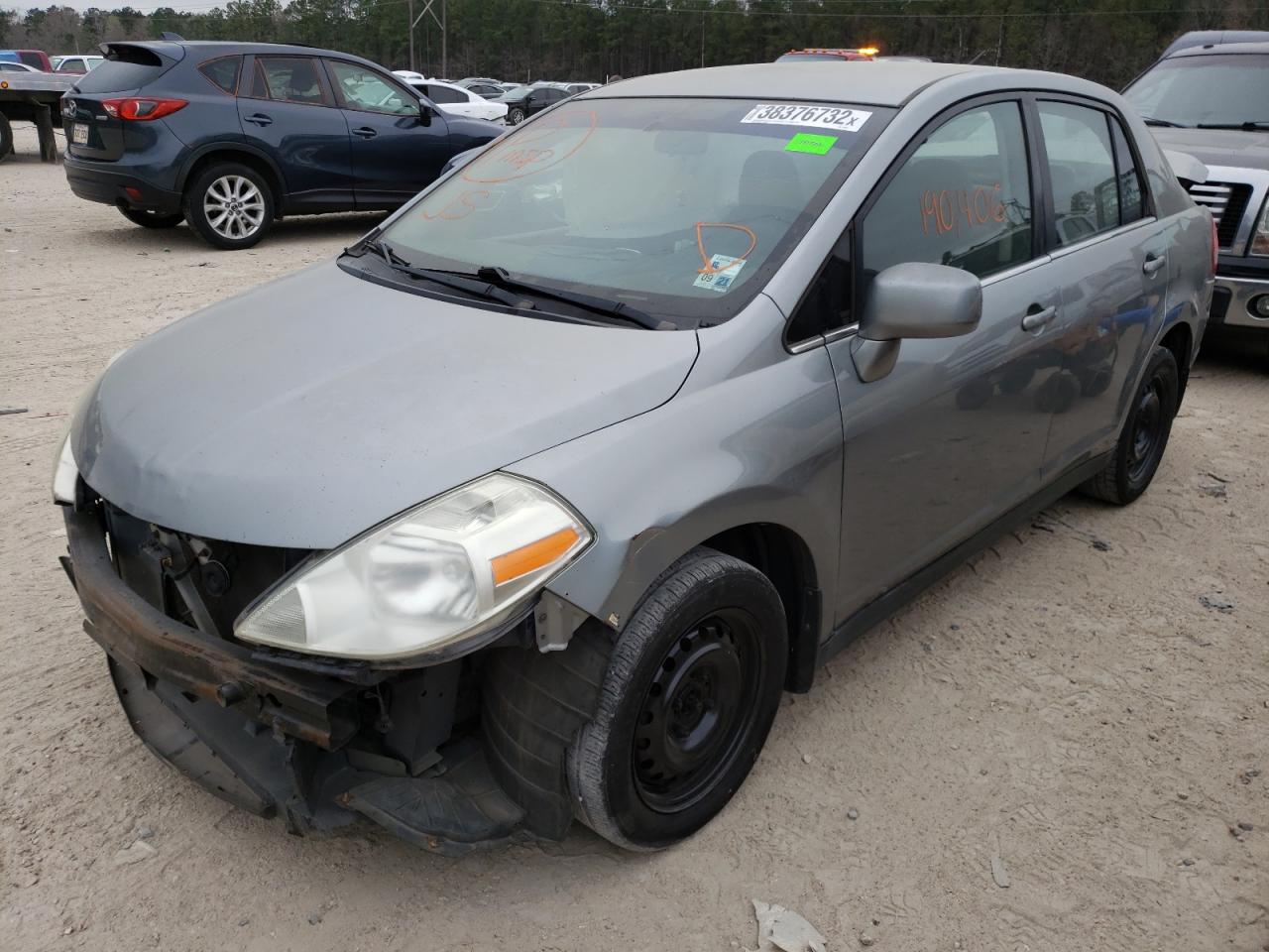 Photo 2 from auction – 2009 NISSAN VERSA S with VIN 3N1BC11E59L384845