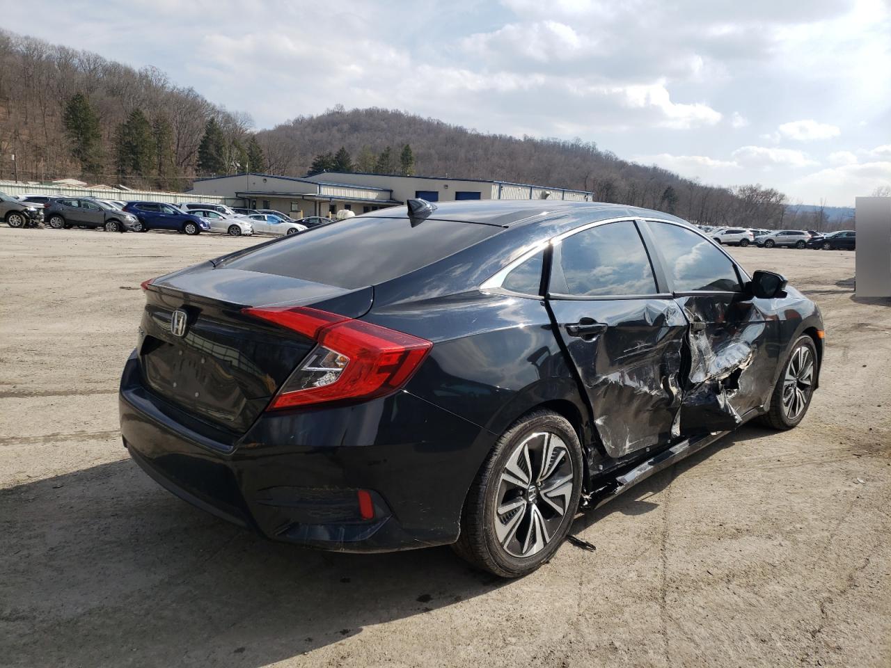 Photo 4 from auction – 2018 HONDA CIVIC EX with VIN JHMFC1F34JX034779