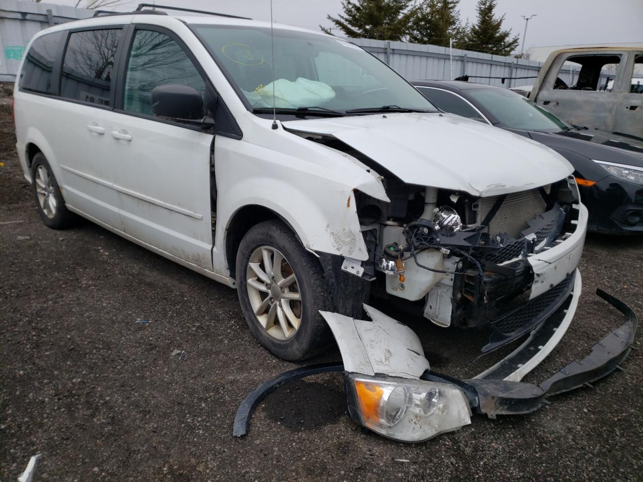 DODGE GRAND CARA 2016 with VIN 2C4RDGBG8GR372782 - Photo from auction