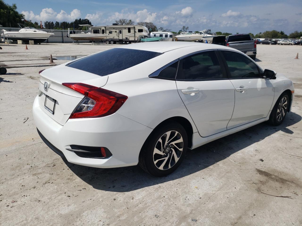 Photo 17 from auction – 2016 HONDA CIVIC EX with VIN 19XFC2F70GE070648