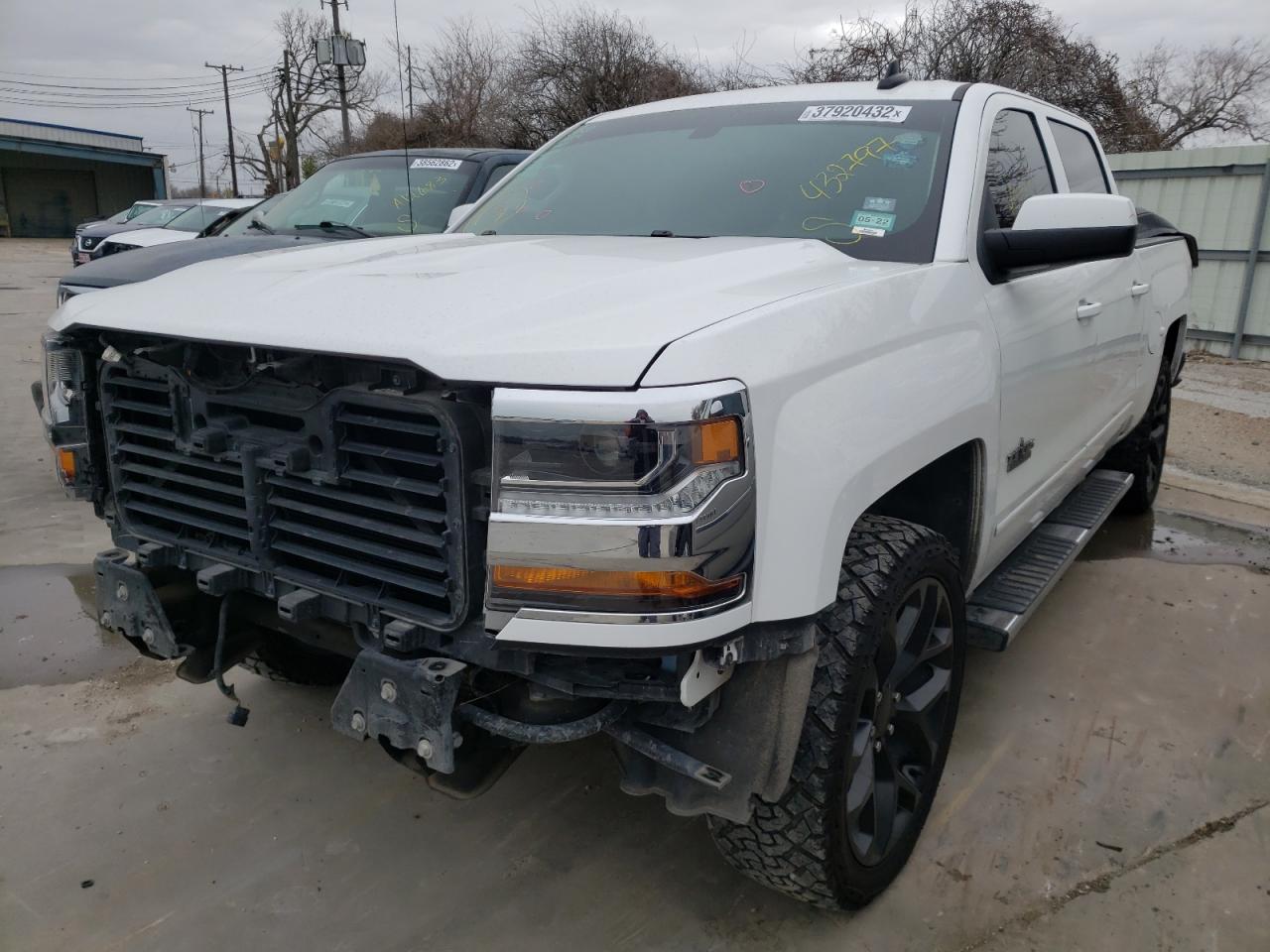 Photo 2 from auction – 2018 CHEVROLET SILVERADO with VIN 3GCUCRER0JG432797