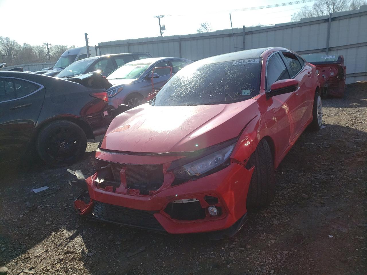 Photo 2 from auction – 2018 HONDA CIVIC LX with VIN 2HGFC2F54JH552907