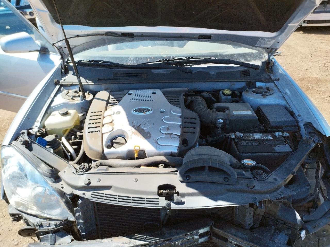 Photo 7 from auction – 2006 KIA OPTIMA LX with VIN KNAGE124265022077