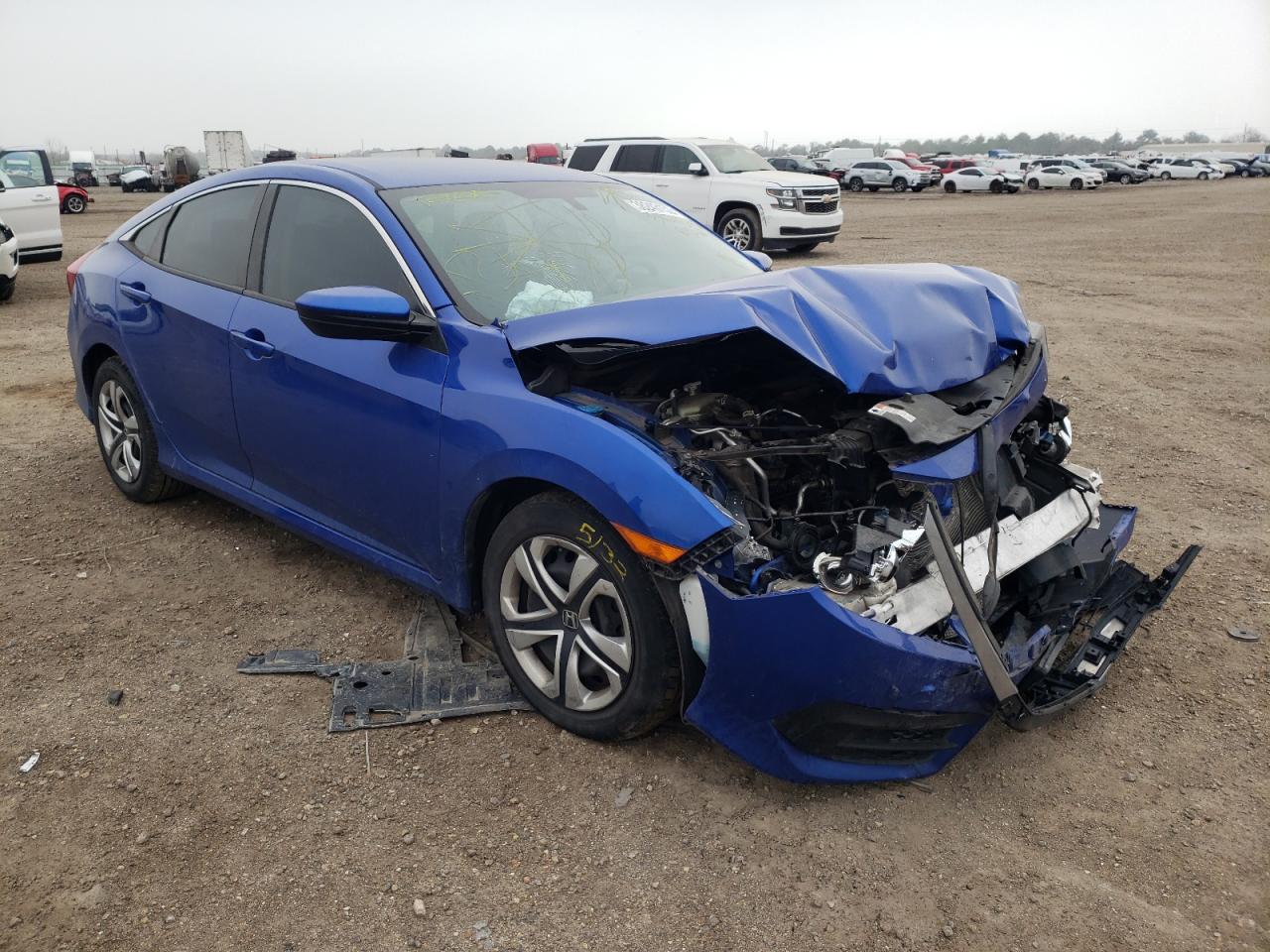 HONDA CIVIC LX 2018 with VIN 19XFC2F56JE012601 - Photo from auction