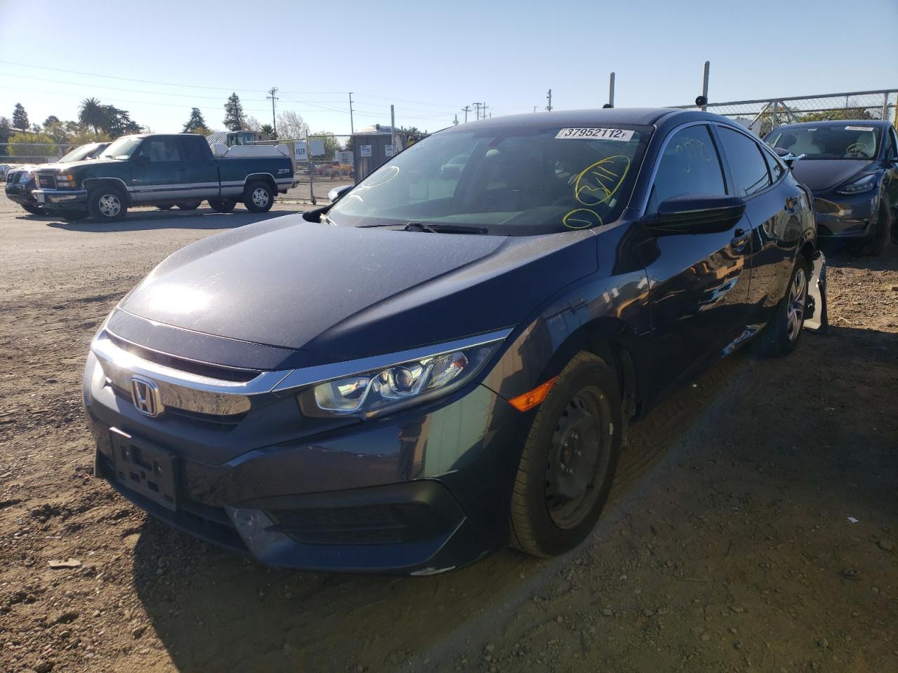 Photo 2 from auction – 2017 HONDA CIVIC LX with VIN 2HGFC2F59HH563735