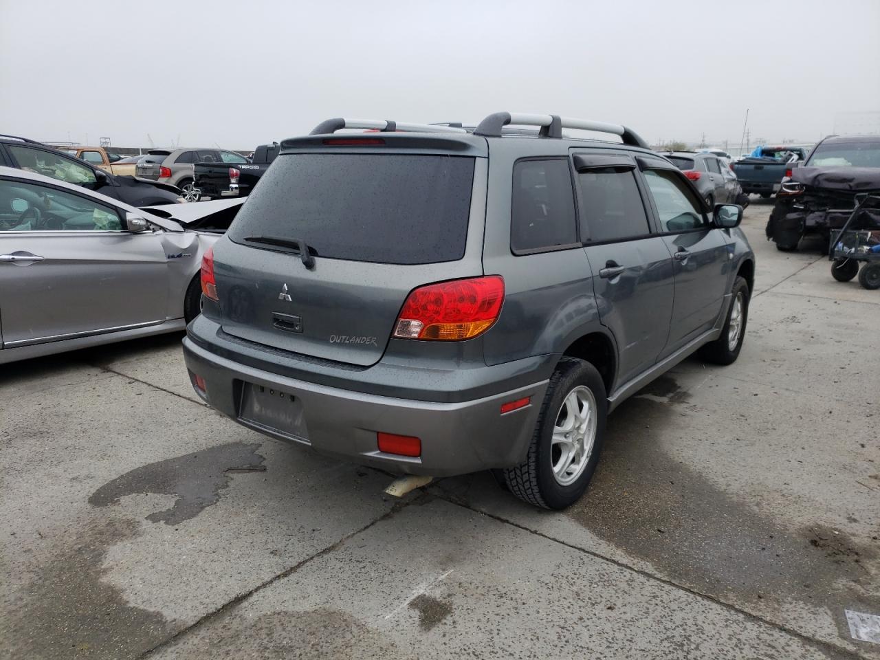 Photo 4 from auction – 2004 MITSUBISHI OUTLANDER with VIN JA4LX31F84U044995