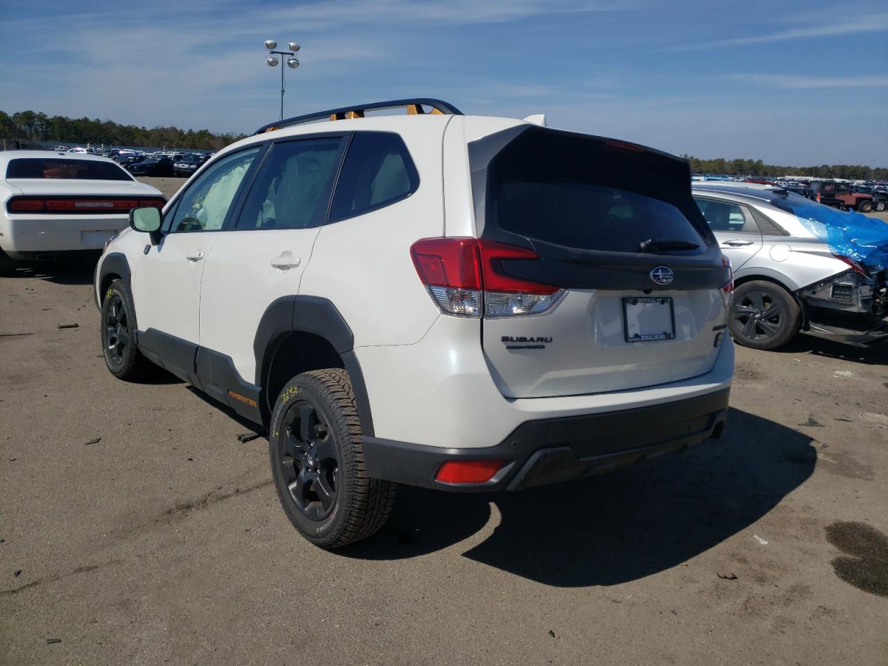 Photo 3 from auction – 2022 SUBARU FORESTER with VIN JF2SKAMCXNH401160