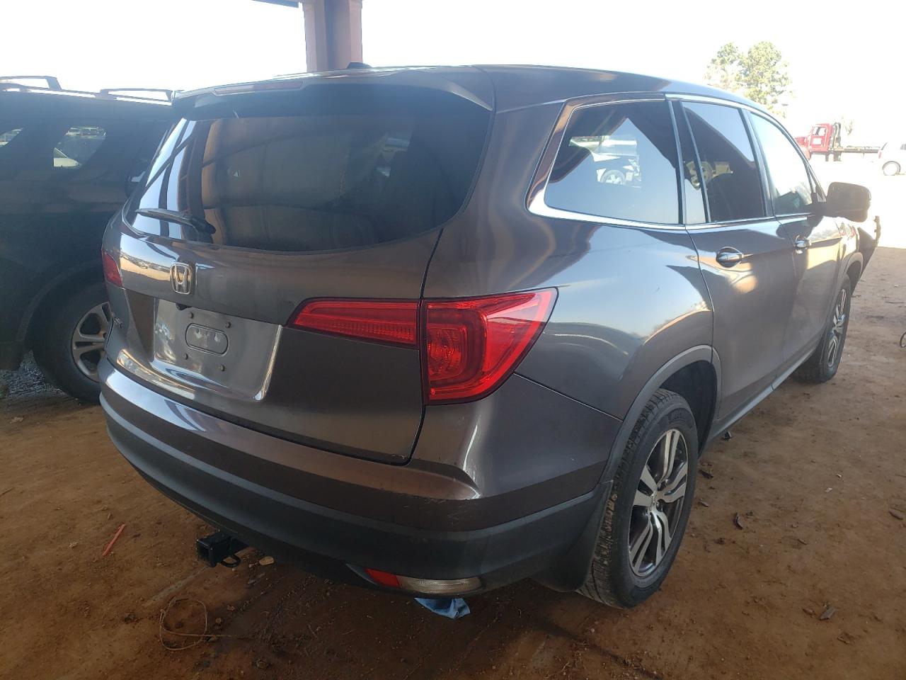 Photo 4 from auction – 2016 HONDA PILOT EXL with VIN 5FNYF5H55GB033151
