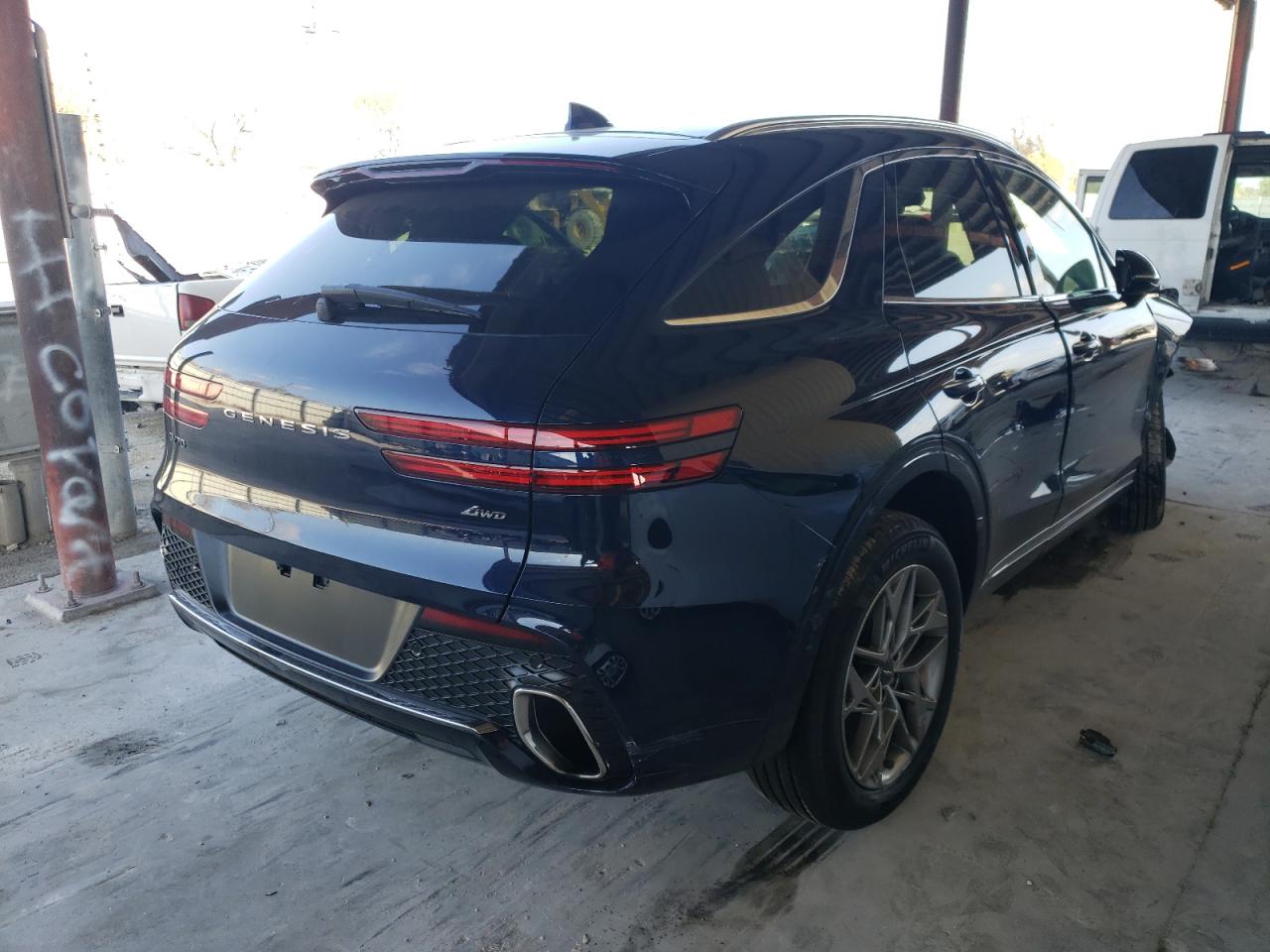 Photo 4 from auction – 2022 GENESIS GV70 BASE with VIN KMUMADTB0NU059954